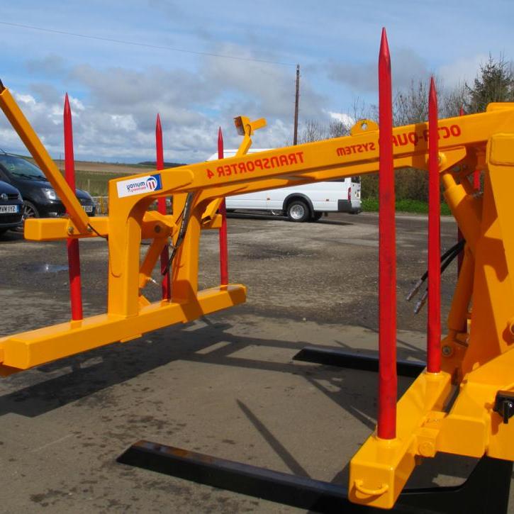 Octa-Quad Bale Handling System - front section for carrying 4 round bales or 2 Heston bales at a time. Showing folding tines version.